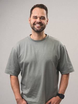 J.